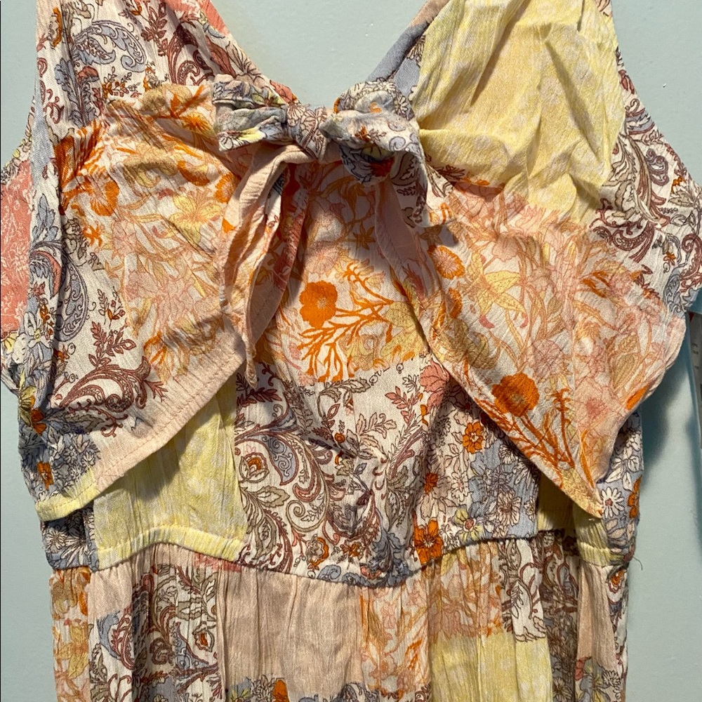 Pretty Summer dress. Never worn. New with tags. Multi color